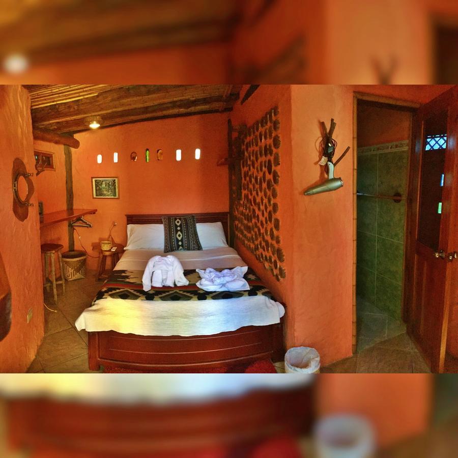 Lonesome George Ecolodge بويرتو أيورا المظهر الخارجي الصورة